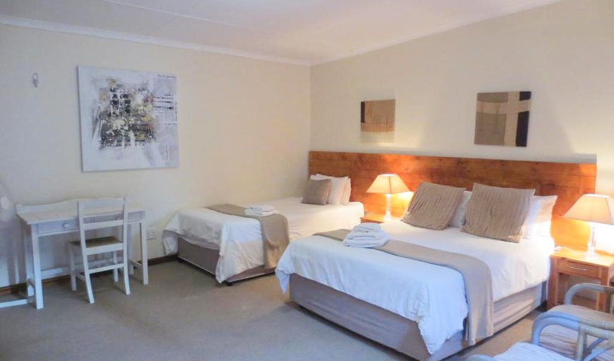 Double & Bunk En-Suite Standard: Family En-Suite room with a Double and a Single Bed.