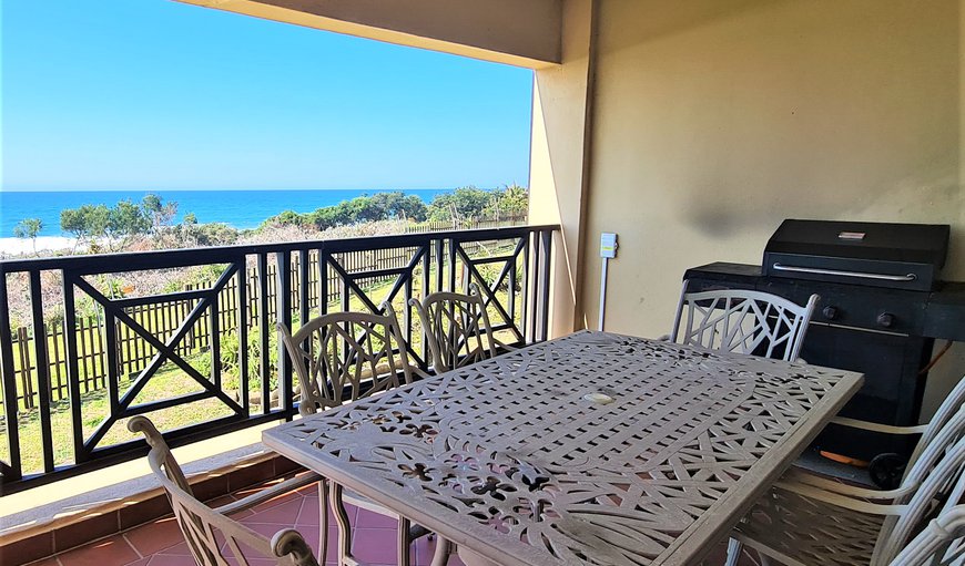 Balcony with seating, gas braai and stunning beach and sea views in Shelly beach, KwaZulu-Natal, South Africa