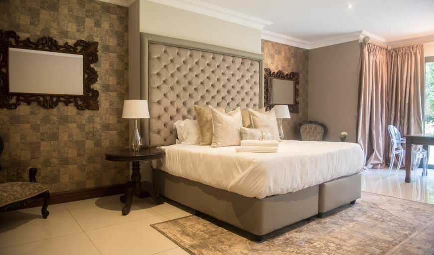 King Suite: The king suite room is decorated with thoughtful touches. Wrap yourself with Egyptian Cotton in this King Size bed. The en-suite bathroom boasts a walk in closet, free standing bathtub and walk in shower You can be assured to feel at home.