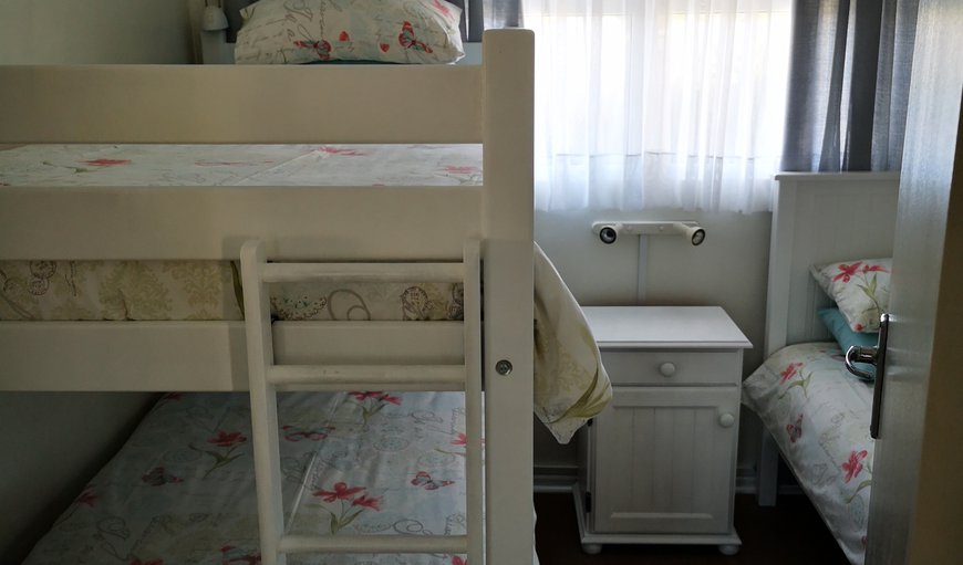 C:64 - Large 2 Bedroom sleeps 4: Bedroom with bunk beds