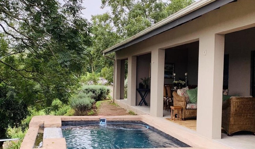 The guest house offers a communal lounge, a bar area, and a dining area, as well as a patio overlooking the Drummond Valley and the swimming pool The guest house offers a communal lounge, a bar area, and a dining area, as well as a patio overlooking the Drummond Valley and the swimming pool