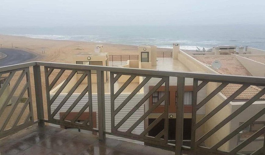 dolphin view: Balcony with a Braai area and a sea view
