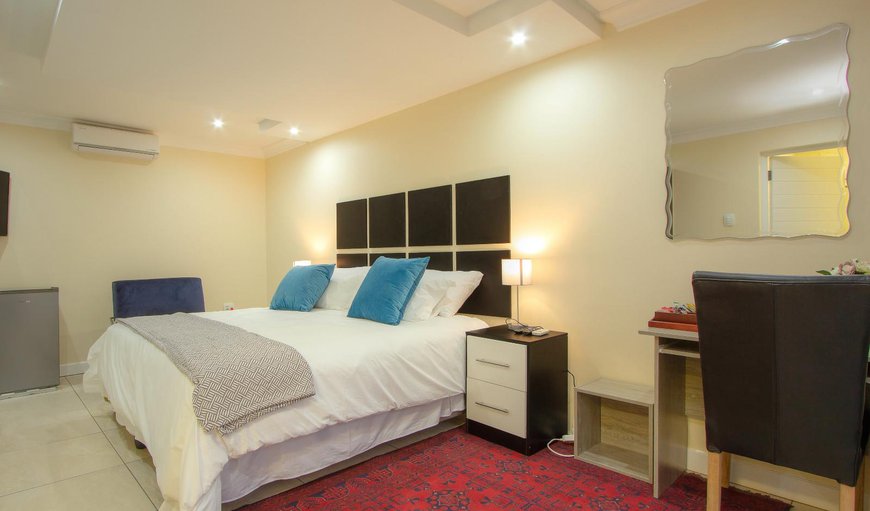 Classic Room: Classic Room - Each room is comfortably furnished with a King size bed and contains air-conditioning, a TV with DSTV, a desk, a mini bar fridge and coffee/tea making facilities.