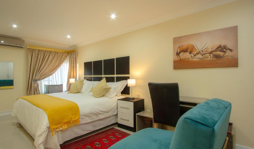 Executive King with Shower: Executive King with Shower - Each room is comfortably furnished with a King size bed and contains air-conditioning, a TV with DSTV, a desk, a mini bar fridge and coffee/tea making facilities.