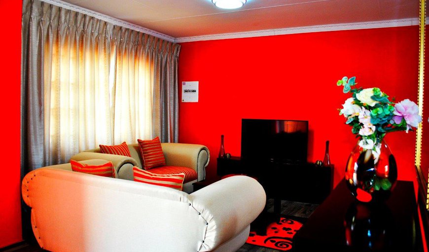 Orange Apartment: The Orange Apartment consists of two bedrooms sharing a lounge and kitchen area