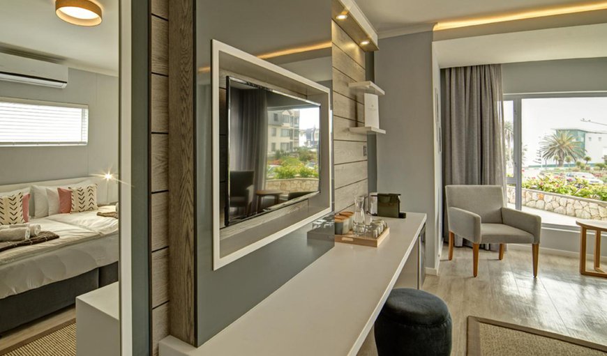 Twin Room - Each room is equipped with air-conditioning, a safe, a TV/DStv, a small fridge, which is not stocked and a tea & coffee station Twin Room - Each room is equipped with air-conditioning, a safe, a TV/DStv, a small fridge, which is not stocked and a tea & coffee station