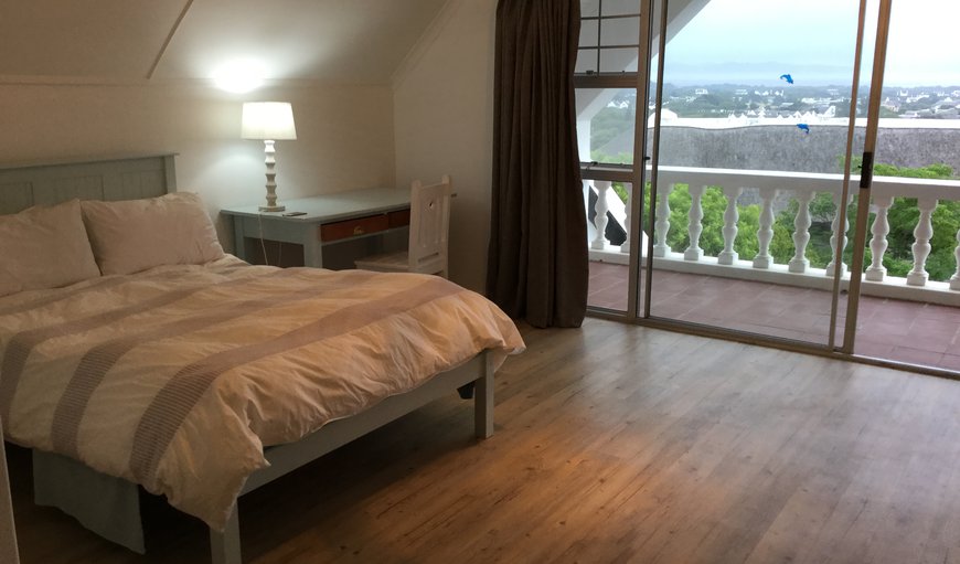 St Francis Bay View Home: The main bedroom is furnished with a double bed and has an en-suite bathroom