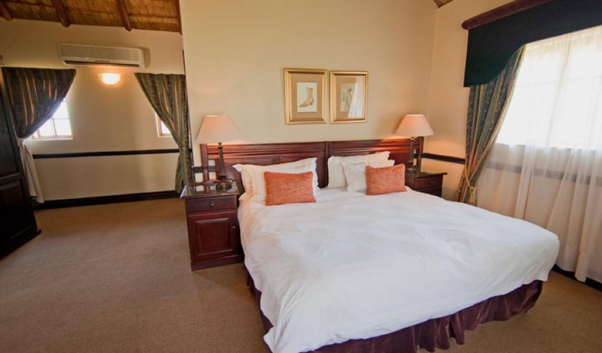 Junior Suites: Junior Suites - Each room is furnished with a king size bed that can be converted into two twin beds