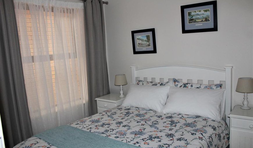 Apartment: The bedroom downstairs is furnished with a double bed