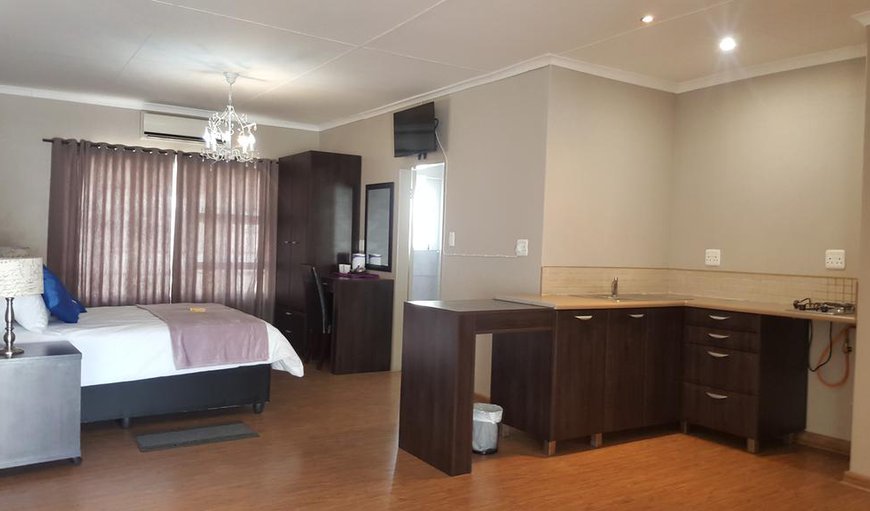 Standard Rooms - Each room is equipped with air-conditioning, a TV with DSTV, Wi-Fi and coffee/tea making facilities Standard Rooms - Each room is equipped with air-conditioning, a TV with DSTV, Wi-Fi and coffee/tea making facilities