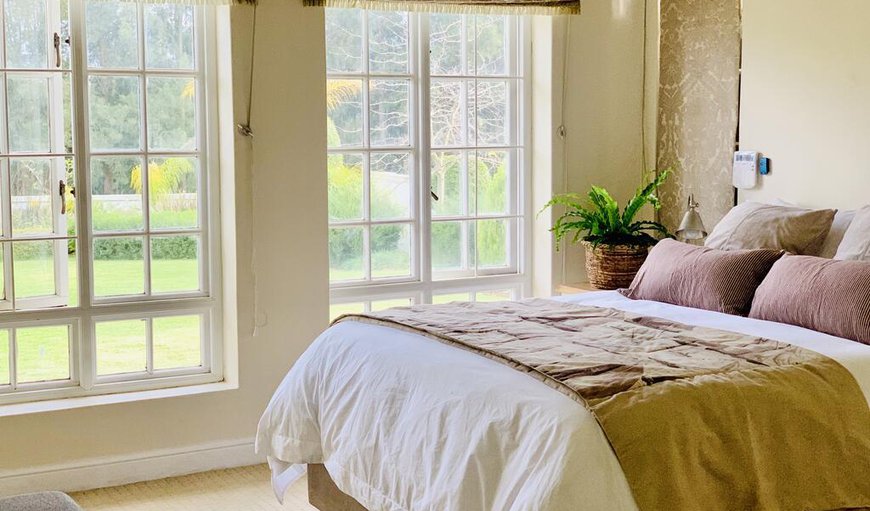 L'Bloom Country House: The main bedroom is furnished with a queen size bed