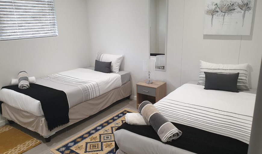 Apartment: The second bedroom offers 2 single beds