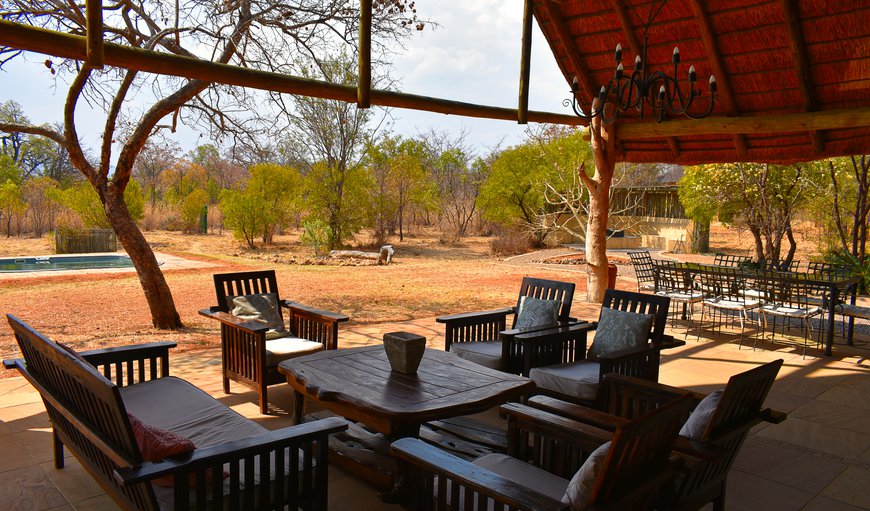The covered verandah contains an outdoor seating and dining area in Bela Bela (Warmbaths), Limpopo, South Africa