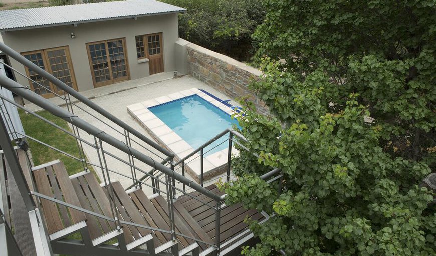 Pear Cottage features an outdoor swimming pool