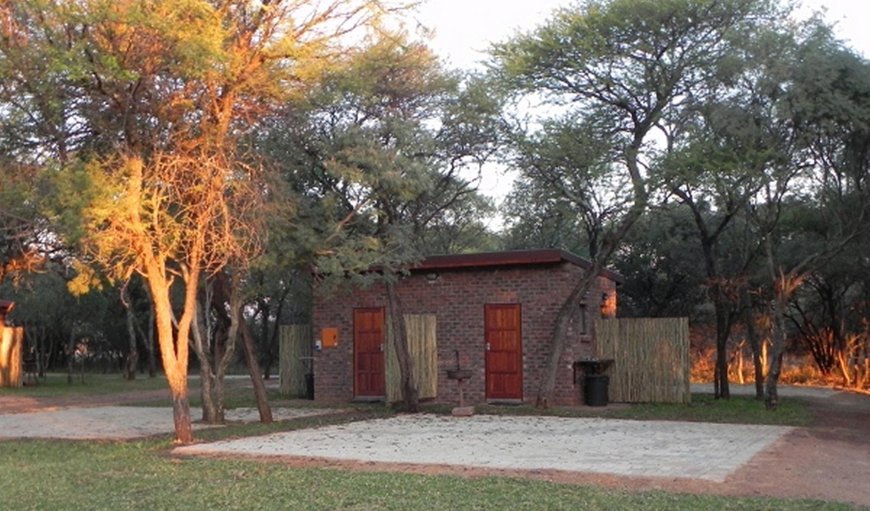 Private Ablution 201: Private Ablution 201 - These paving stands has shade, braai facilities and own bathrooms