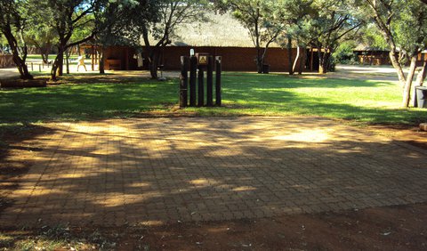 Standard Stand 18 / Paving: Standard Stand 12 & 17 - 19 & 22 & 28 - 32 & 36 - 44 & 47 & 52 & 62 / Paving - These sites has braai facilities and shared ablution facilities, but no shade