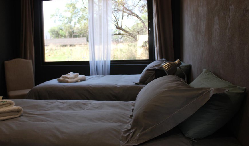 Blouwildebees Uitsig - Two of the bedrooms are each furnished with 2 three quarter beds, while the other two each contain 2 single beds Blouwildebees Uitsig - Two of the bedrooms are each furnished with 2 three quarter beds, while the other two each contain 2 single beds