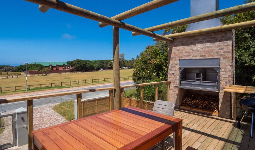Candlewood Suite: Candlewood Suite - The unit features a deck with a built-in stainless-steel braai and weber