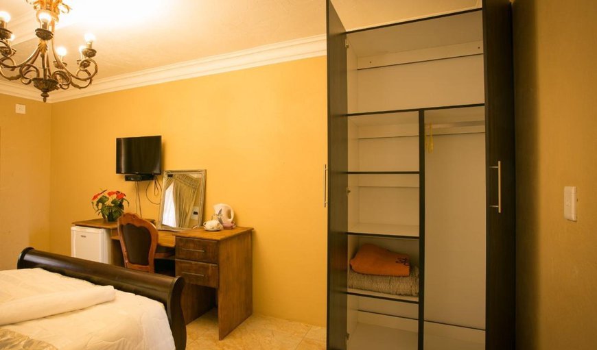 Executive Room: Executive Room - This bedroom is furnished with a king size bed