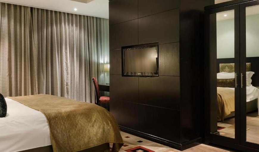 Suites: Suites - This room is elegantly furnished with a king size bed
