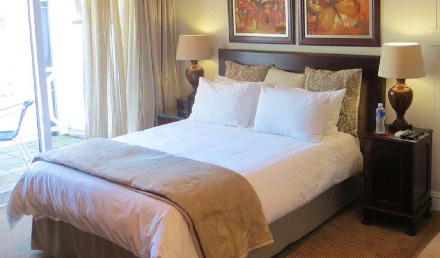 Standard Queen Rooms: Standard Queen Rooms - Bedroom with a queen size bed