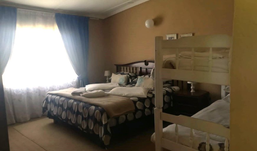 Standard Family: Standard Family - This room is furnished with a king size bed and a bunk bed