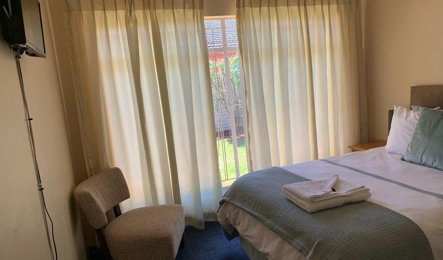Budget Room - This bedroom is furnished with a double bed in Vereeniging, Gauteng, South Africa