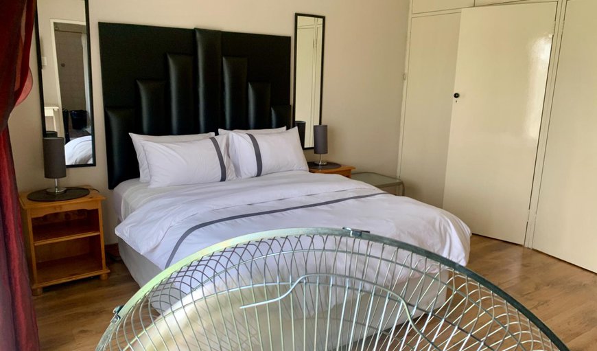 Deluxe Room: Deluxe Room - The bedroom is furnished with a double bed