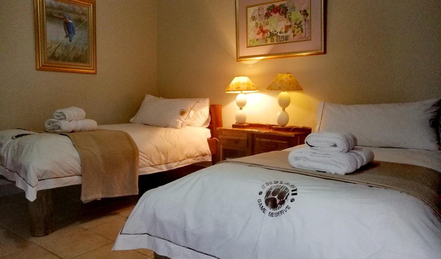 Butterfly: Butterfly - This bedroom is furnished with twin beds