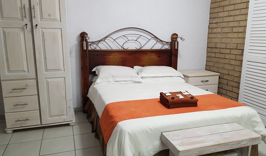 St Lucia Safari Lodge UNIT 2: The unit is furnished with a double bed and 2 single beds