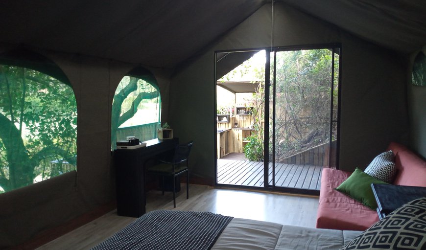 The Wild: The Lodge tent with a queen size bed and sleeper couch