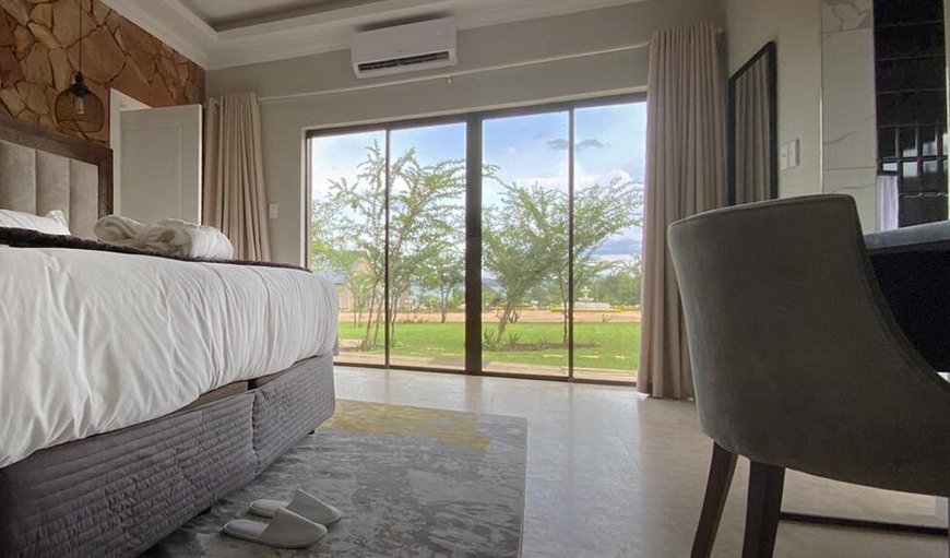 The Elisa Villa: The Elisa Villa - Bedroom with a king size bed