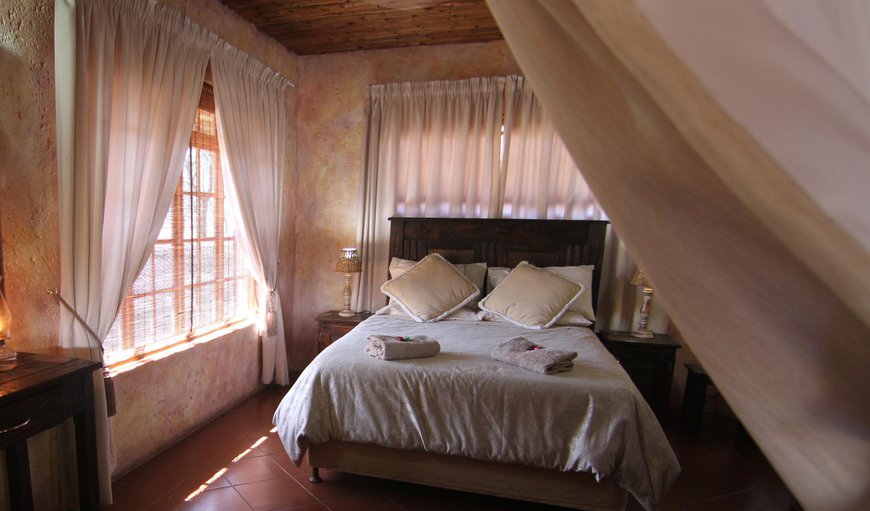 Chalet 03: Chalet 03 - The main bedroom is furnished with a double bed