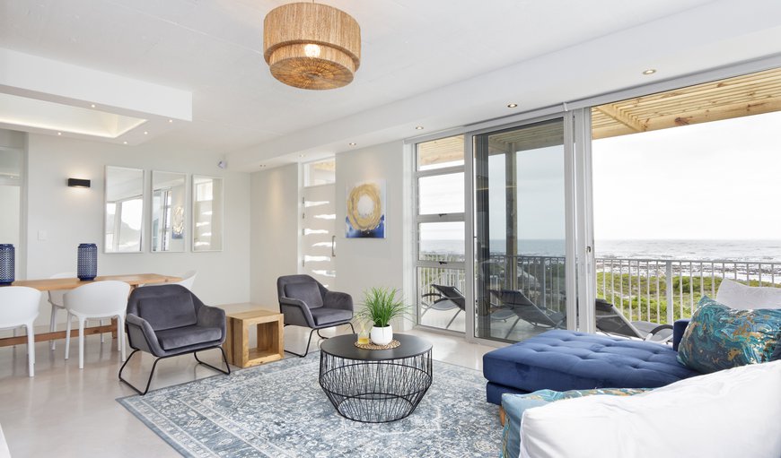 The lounge and kitchen on the top floor open into a stylish open plan space, leading to a neat, refreshing balcony with stunning sea views The lounge and kitchen on the top floor open into a stylish open plan space, leading to a neat, refreshing balcony with stunning sea views
