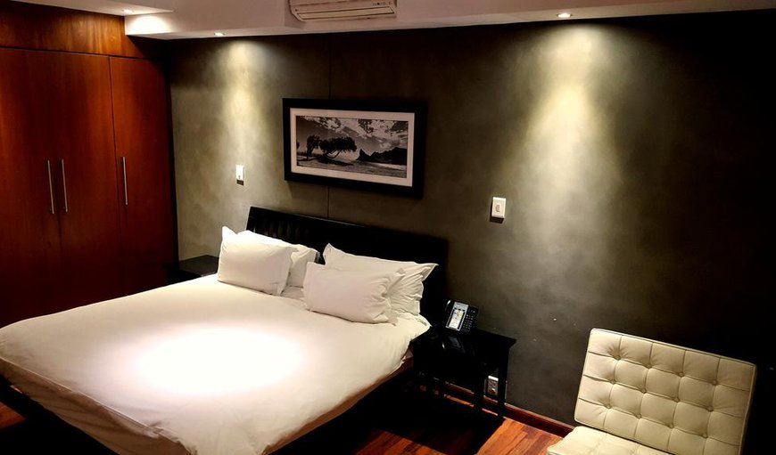 Luxury One-Bedroom Apartment with Balcony: Bedroom