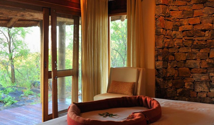 Luxury Thatched Chalets: Bedroom with a king size bed or twin 3/4 beds - please request desired bed type