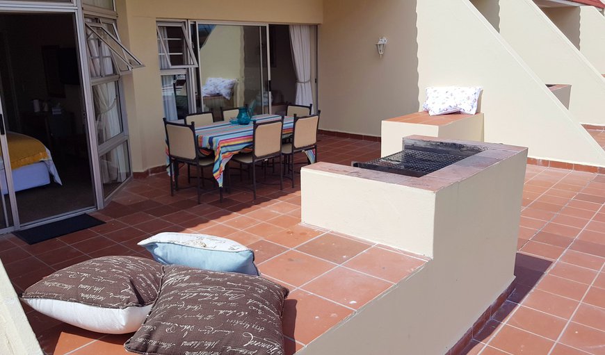 The living area opens up onto a lovely patio area that has outdoor patio furniture, and braai facilities The living area opens up onto a lovely patio area that has outdoor patio furniture, and braai facilities