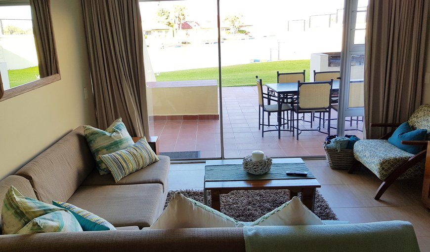 The living area opens up onto a lovely patio area that has outdoor patio furniture, and braai facilities The living area opens up onto a lovely patio area that has outdoor patio furniture, and braai facilities