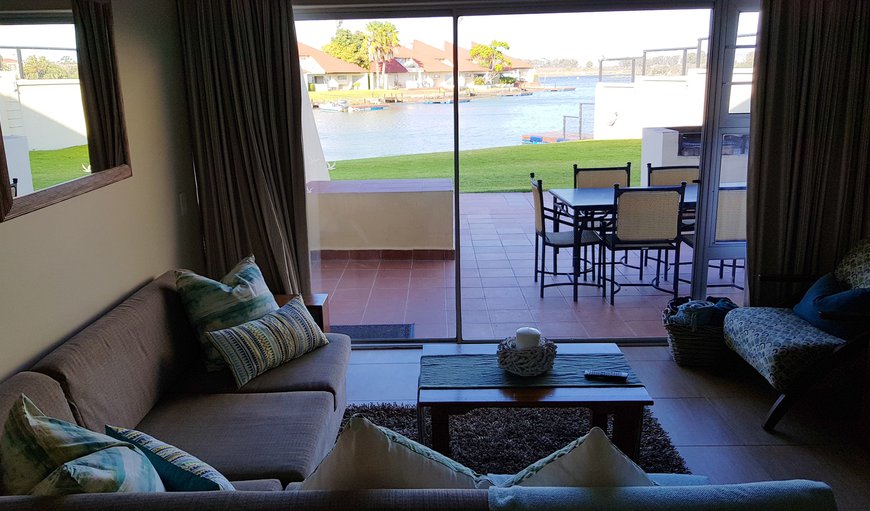 The living area opens up onto a lovely patio area that has outdoor patio furniture, and braai facilities The living area opens up onto a lovely patio area that has outdoor patio furniture, and braai facilities