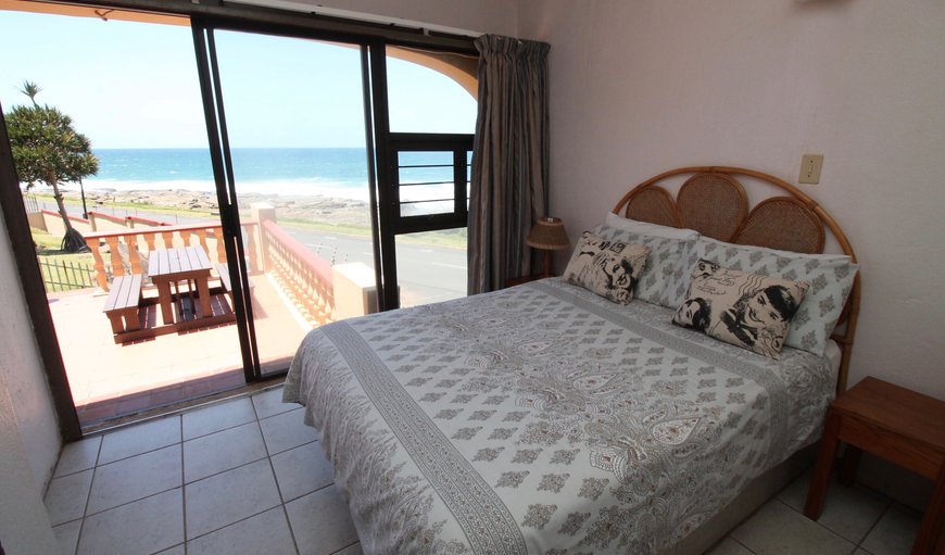 Uvongo Cabanas 01B: Bedroom with a double bed