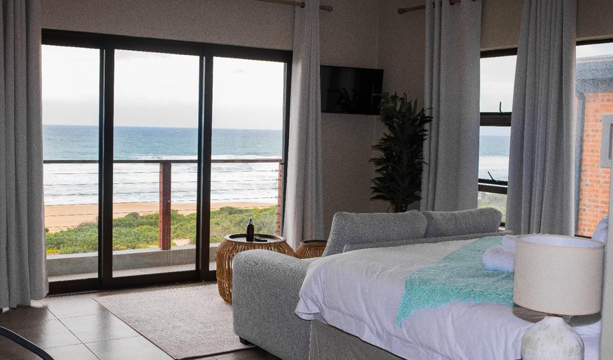 Self Catering unit 1: Each room in this seafront guesthouse has 180 degree view of the warm Indian Ocean with a comfortable king size bed