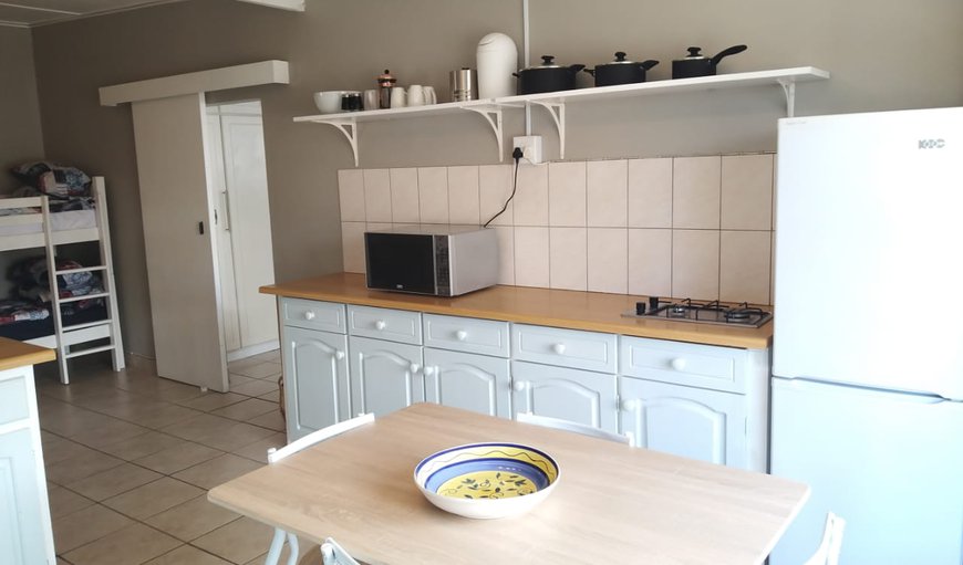 Open plan kitchenette with dining area