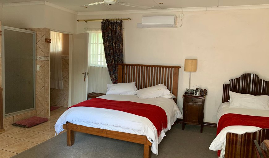 Deluxe Triple Rooms: Deluxe Triple Rooms - Bedroom with a double bed and a single bed