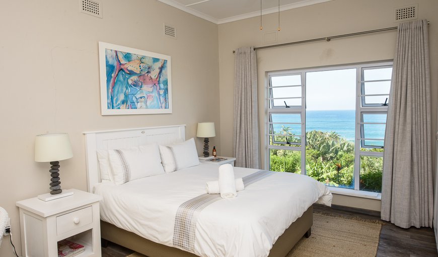 The Beach Cottage on Dolphin Bay: Bedroom with a queen size bed