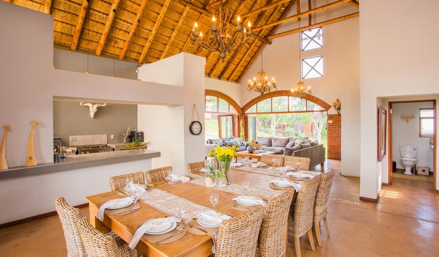 Living area with dining table and equipped Kitchen