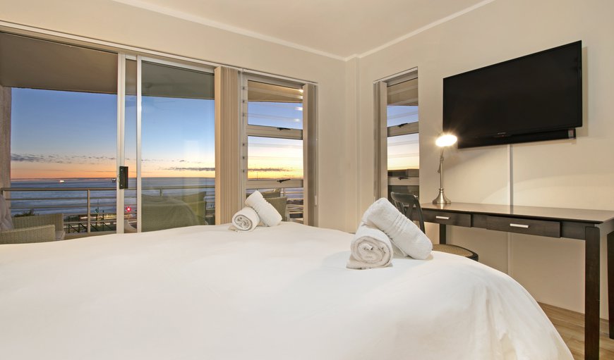 Comfort Self-catering Apartment: The main bedroom has a queen size bed with access to the balcony