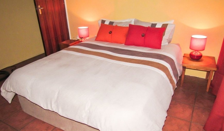 Kruger River View: Bedroom with a double bed