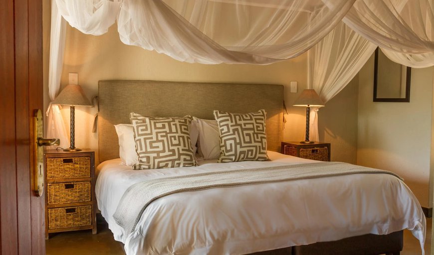 Zebra Lodge: Bedroom with a king size bed
