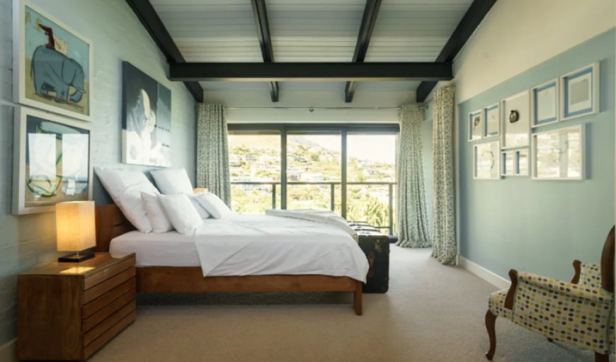 Llandudno Ocean Escapes: Bedroom with a king size bed