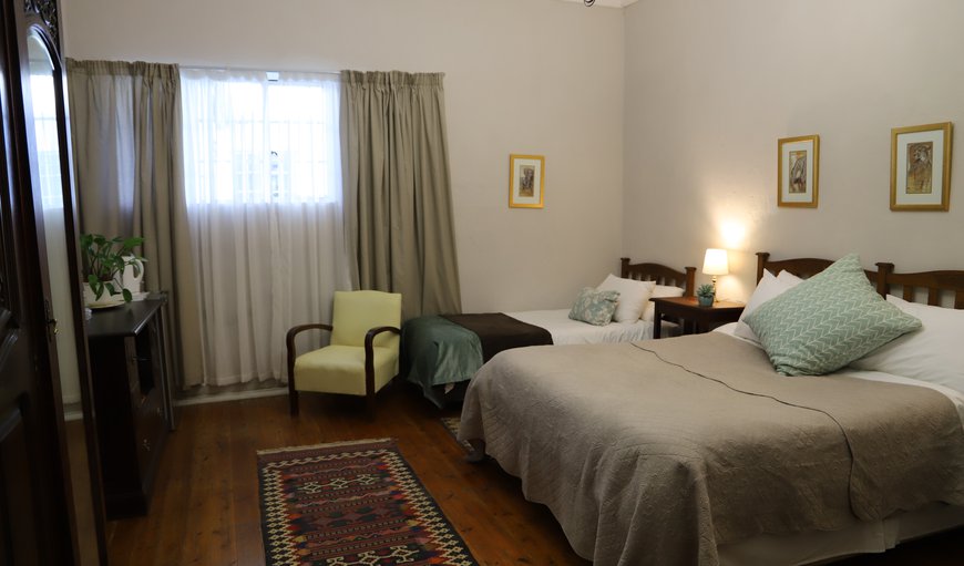 Stoep Room 4 (Family Room): Stoep Room 4 (Family Room) - Bedroom with a queen size bed and 2 single beds